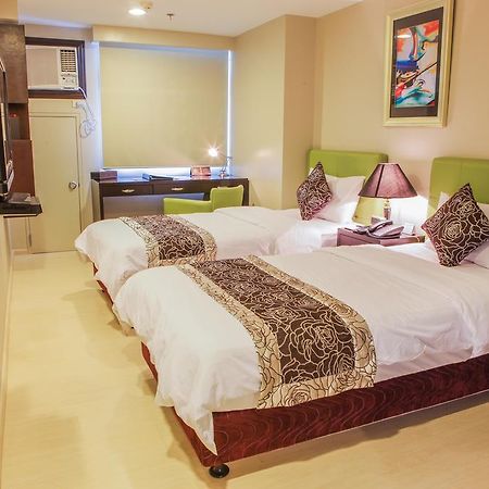 The Exchange Regency Residence Hotel Managed By Hii Pasig City Экстерьер фото