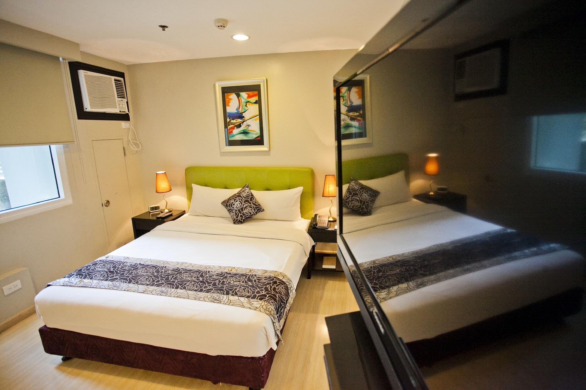 The Exchange Regency Residence Hotel Managed By Hii Pasig City Экстерьер фото