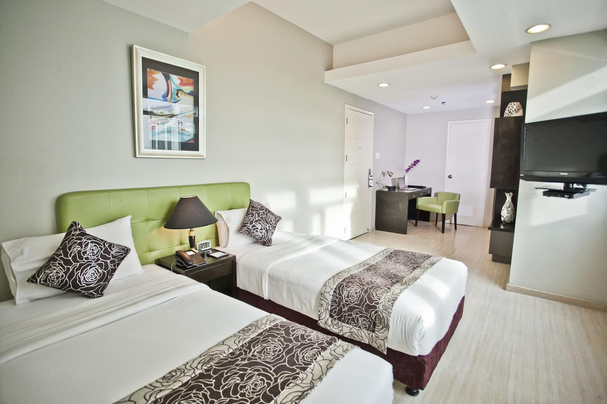 The Exchange Regency Residence Hotel Managed By Hii Pasig City Экстерьер фото