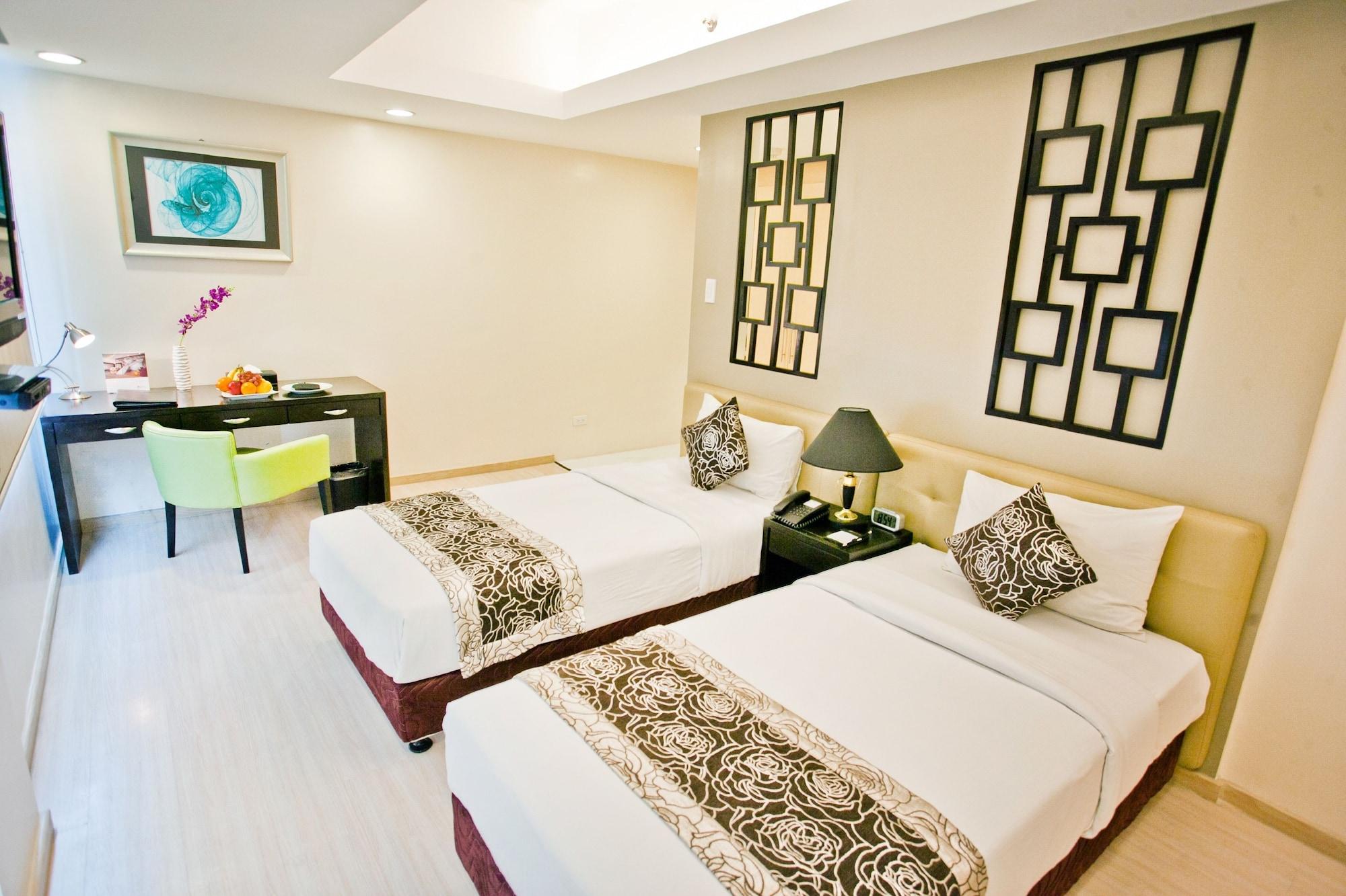 The Exchange Regency Residence Hotel Managed By Hii Pasig City Экстерьер фото