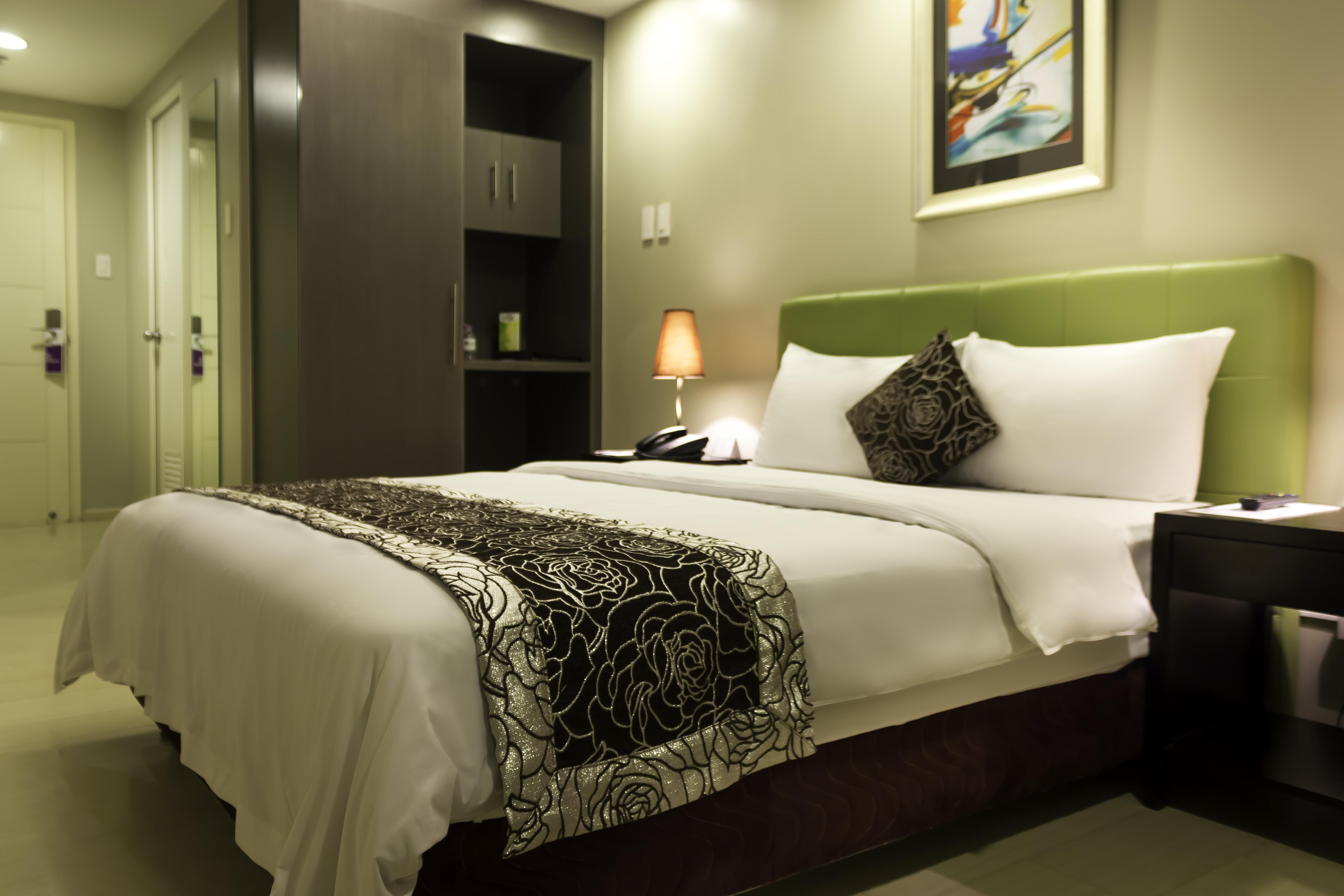The Exchange Regency Residence Hotel Managed By Hii Pasig City Экстерьер фото
