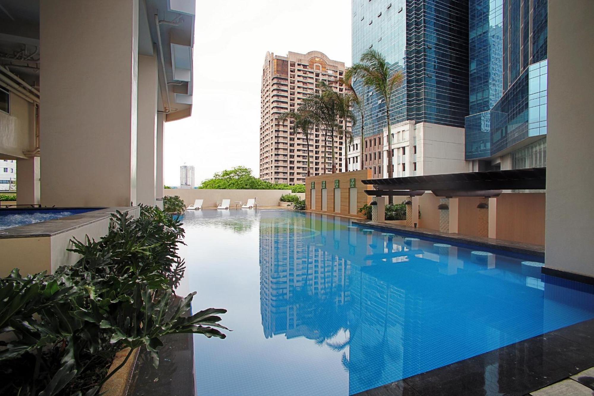 The Exchange Regency Residence Hotel Managed By Hii Pasig City Экстерьер фото
