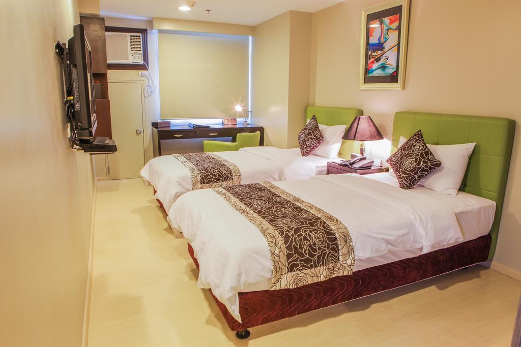The Exchange Regency Residence Hotel Managed By Hii Pasig City Экстерьер фото