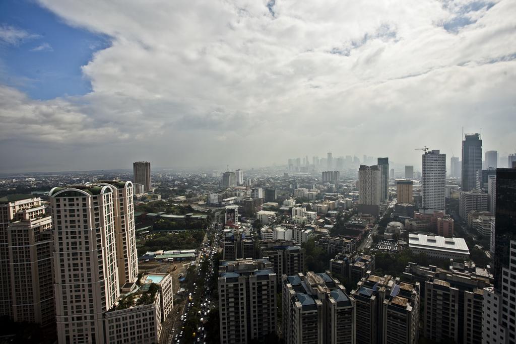 The Exchange Regency Residence Hotel Managed By Hii Pasig City Экстерьер фото